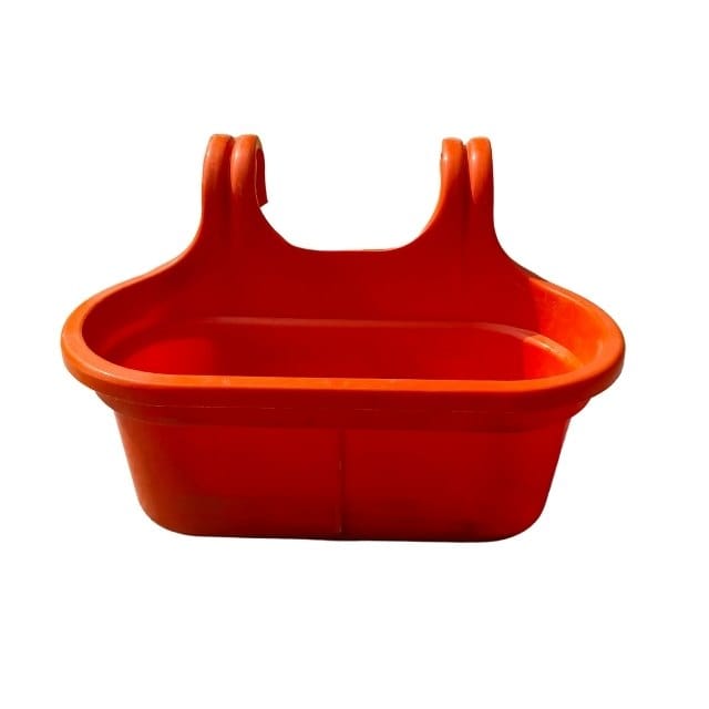 Orange plastic basket with handles on a white background