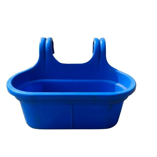 Blue plastic feed trough on a white background
